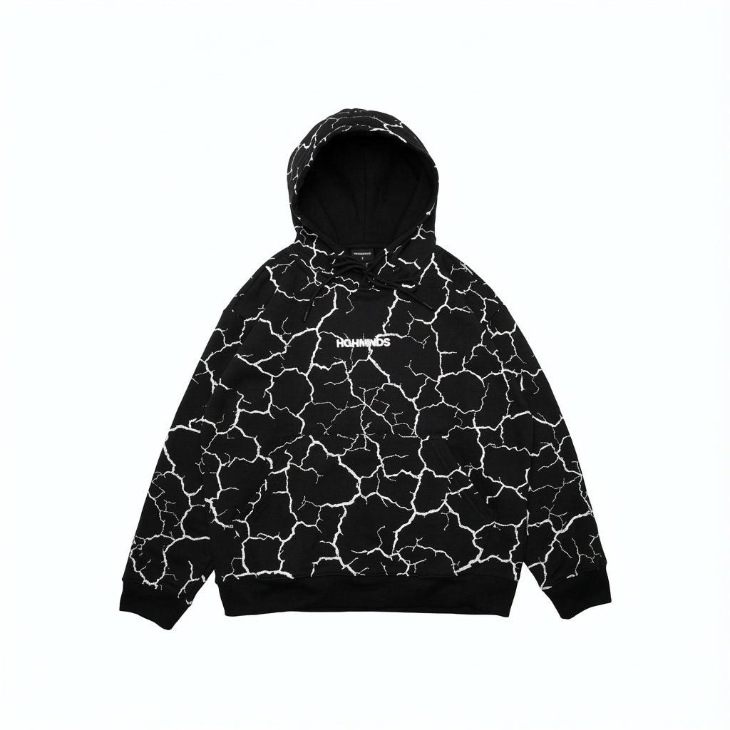 Black hoodie and sweatpants with white cracked earth pattern.